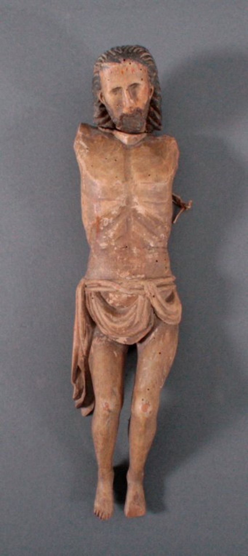 Holz-Skulptur Jesus, 17./18. Jh.Aus dem Vollholz geschnitzt, farbig gefasst, die Armefehlen, ca.
