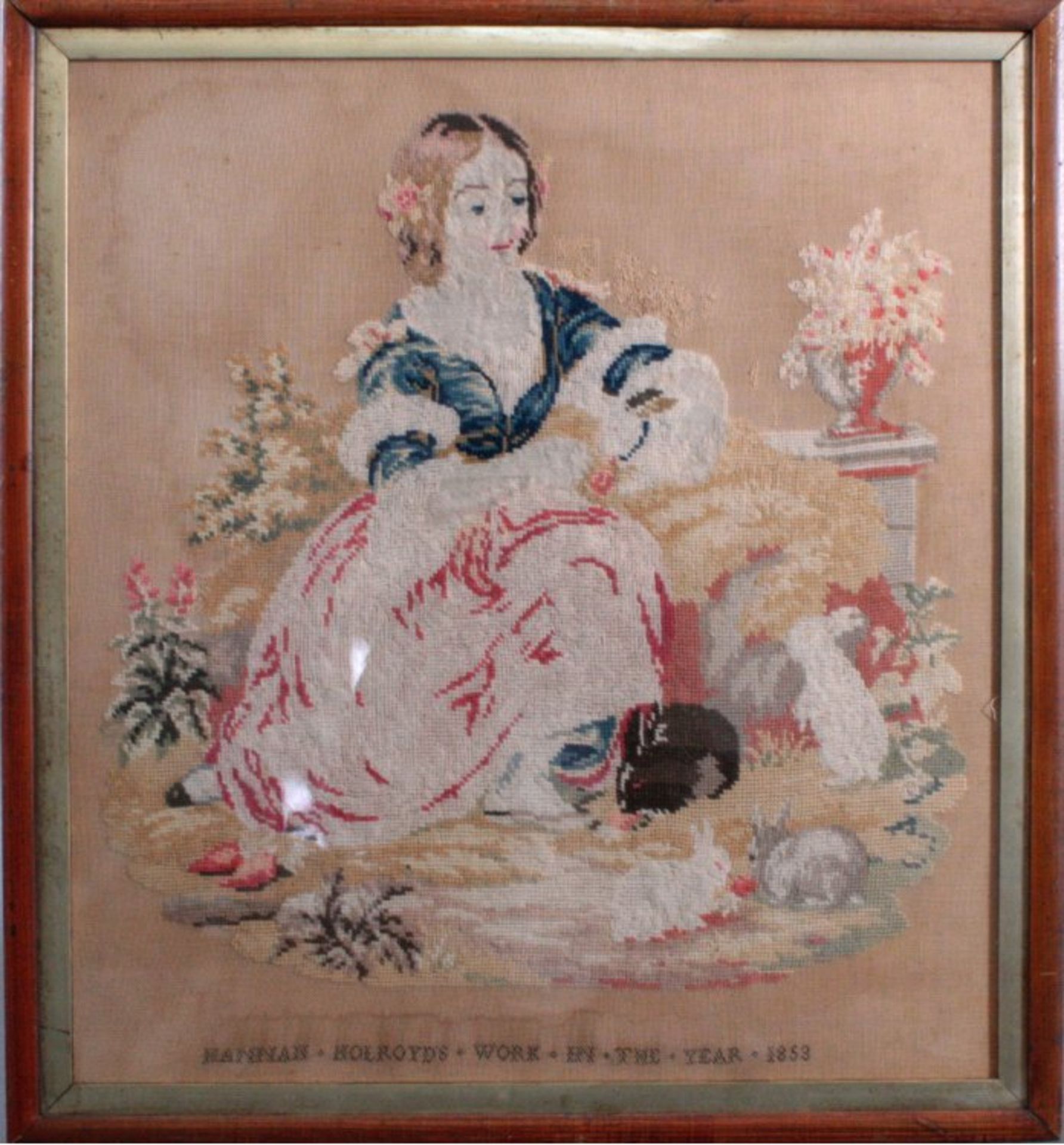 Dekorativer Biedermeier StickbildGalante Darstellung eine junge Frau mit Hasen. Bezeichnet:Hannah,