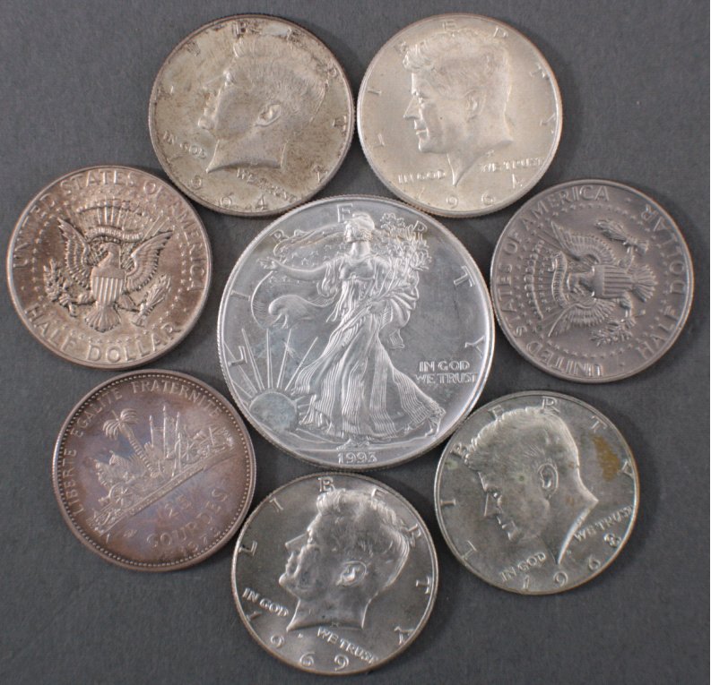 Silbermünzen USA, Liberty Dollar 1993 und 6 x 1/2 DollarKennedy Half Dollar, dazu 25 Gourdes aus