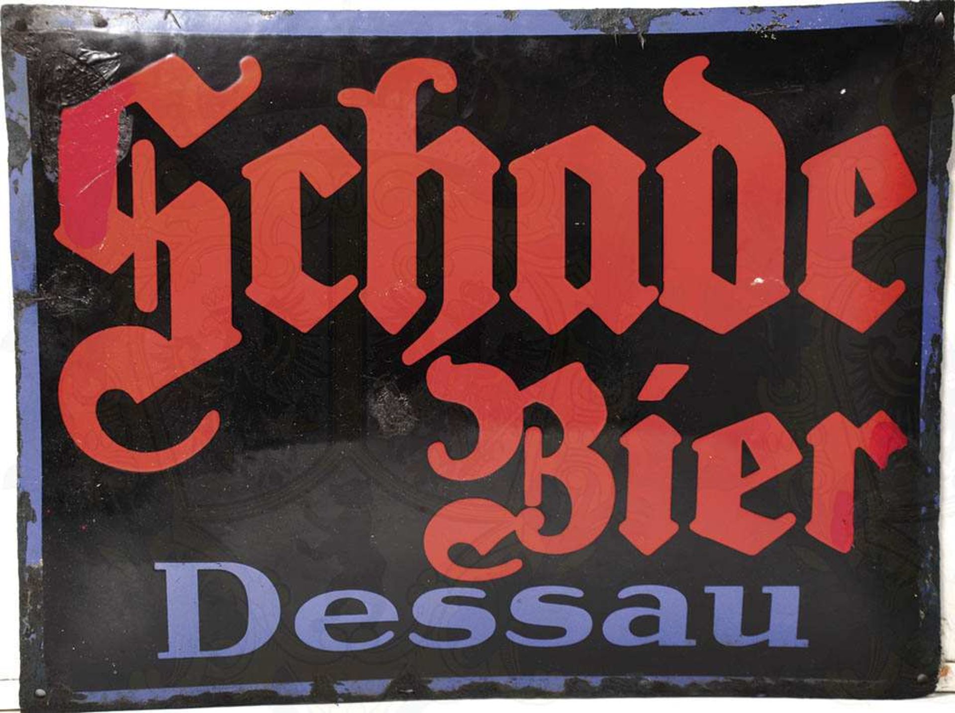 WERBE-SCHILD "SCHADE BIER DESSAU", Eisenblech, schwarz emaill., Schriftzüge u. Rand rot u. blau