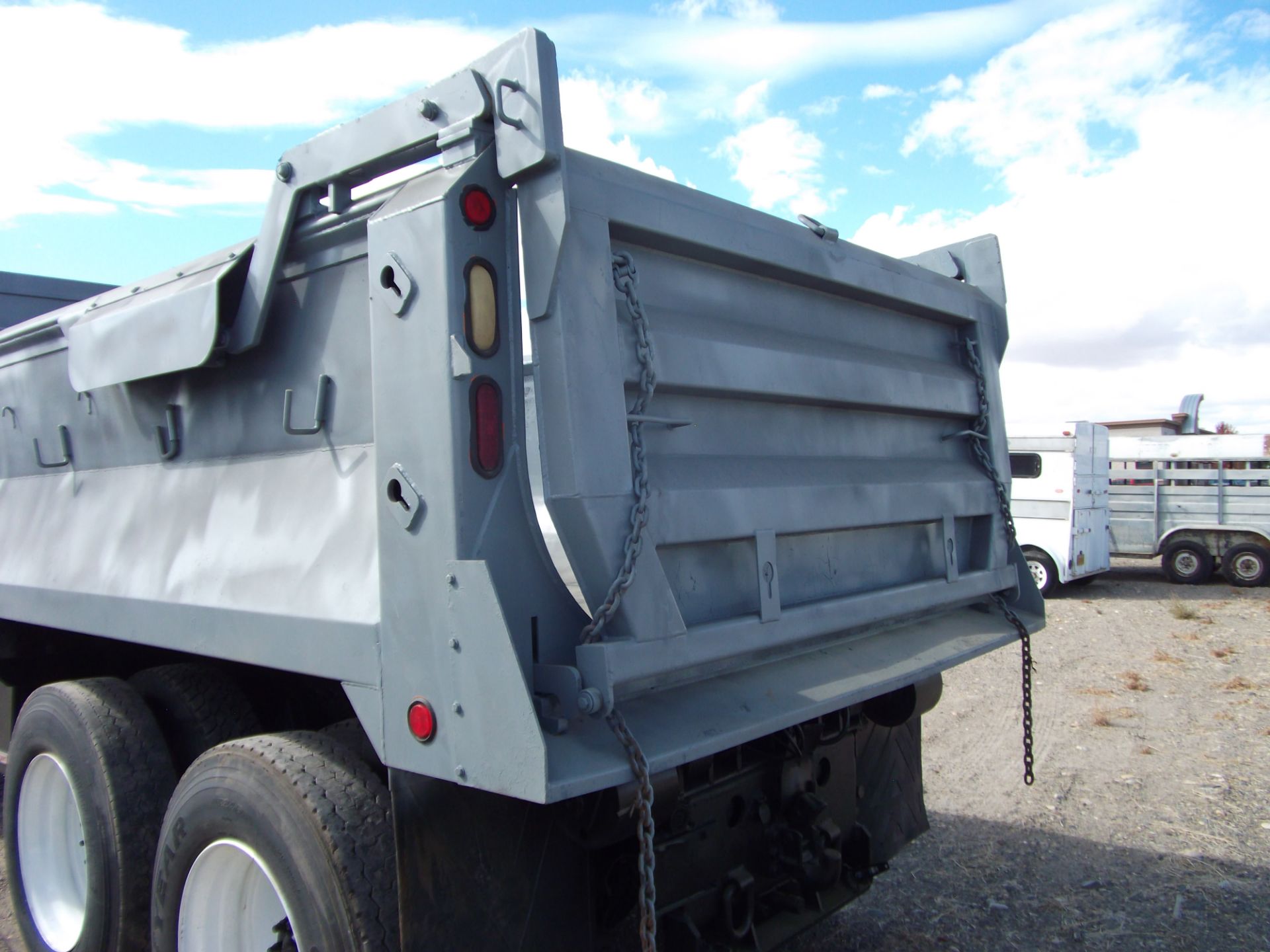 2000 IHC tandem axle dump truck Cummins engine 5spd 2spd hook roll Off quick change 10 yd. Gravel - Image 8 of 12