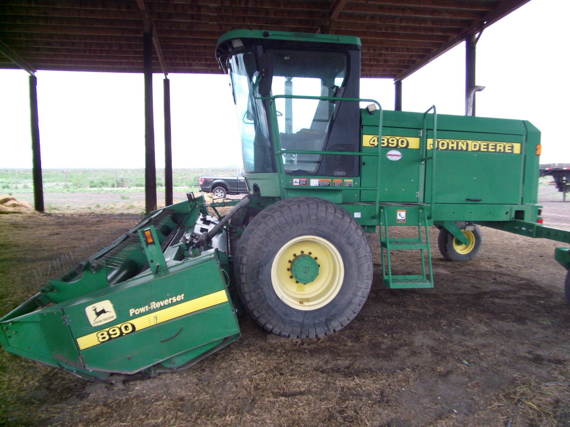 JD 4890 swather w/16' 890 power Reverser head 2776 hrs.