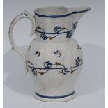 An early 19th century Pratt Ware jug, in relief with leaves,