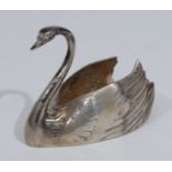 A Chinese silver novelty salt, as a swan, gilt interior,