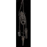 A 19th century Grecian Revival silver plated chatelaine, as a Classical female mask,