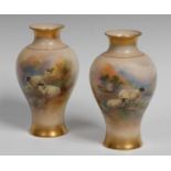 A pair of Royal Worcester baluster vases, painted by Harry Davis,