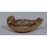 A Coalport type oil lamp, decorated with diamonds and stylised foliage, in tones of puce,