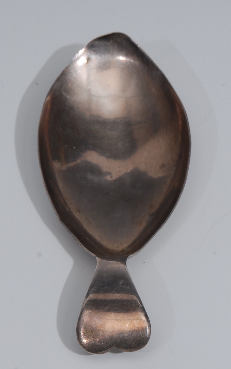 A George III silver fish shaped caddy spoon, 8.