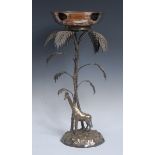 A Victorian plated centrepiece, cast as a giraffe, standing under a palm tree, associated bowl,