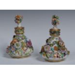 A pair of English Porcelain ogee shaped scent bottles and stoppers,