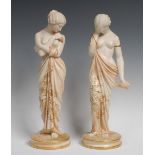 A pair of Royal Worcester figures, Joy and Sorrow, in blush ivory picked out in raised gilt,