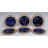 A set of six Wedgwood majolica plates, each painted with stylised floral sprigs,