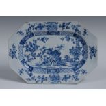 A Bow canted rectangular serving plate, painted in underglaze blue with prunus,