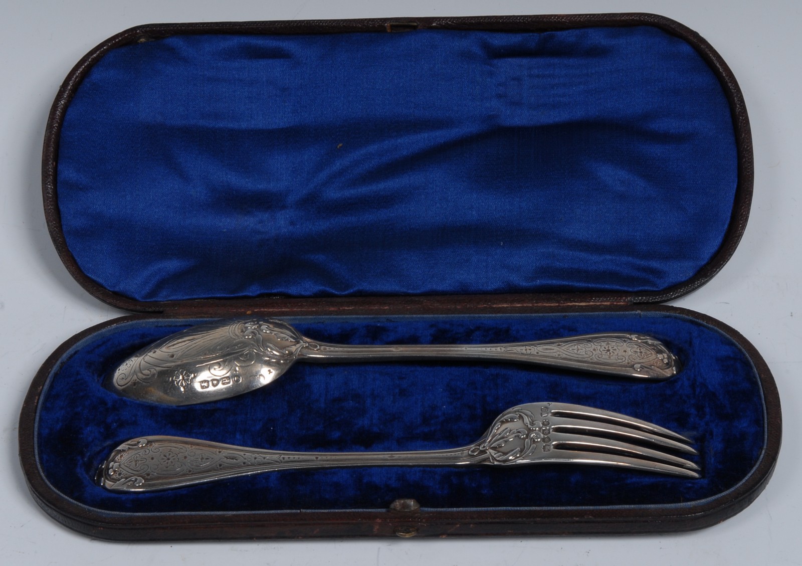 A Victorian silver christening spoon and fork, George W Adams, London 1870,