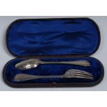 A Victorian silver christening spoon and fork, George W Adams, London 1870,