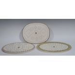 A Spode Creamware oval strainer, the border with stylised leaves in tones of grey, 37cm wide, c.