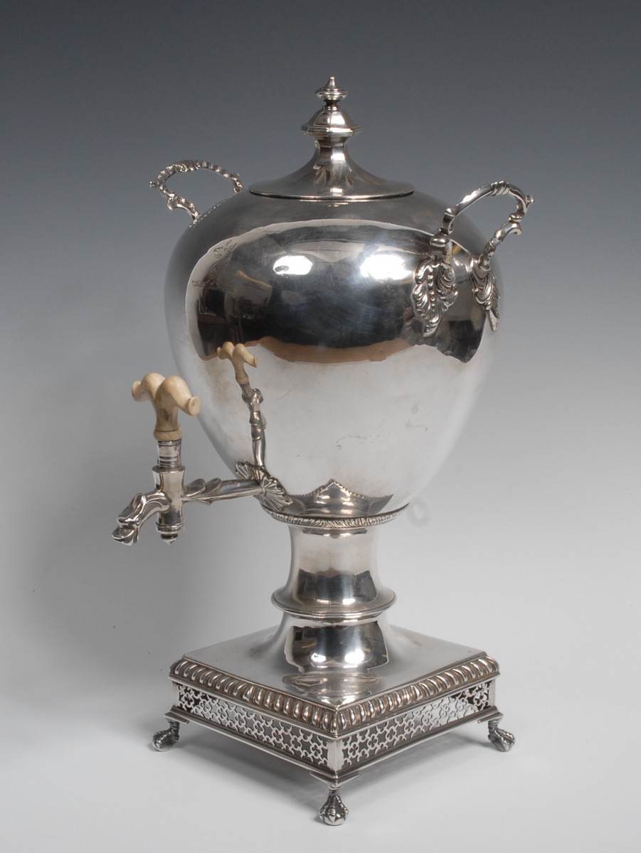 A 19th century silver plated ovoid pedestal samovar, octagonal panelled knop finial,