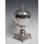 A 19th century silver plated ovoid pedestal samovar, octagonal panelled knop finial,