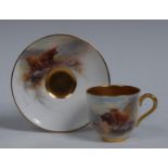 A Royal Worcester cabinet cup and saucer, painted by Jas Stinton, signed, with Highland cattle,