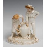 A Hadley Worcester figure group, in the white, picked out in gilt,