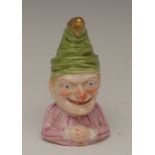 A rare Royal Worcester candlesnuffer, Mr Punch, he wears a green pointed cap, gilt end,