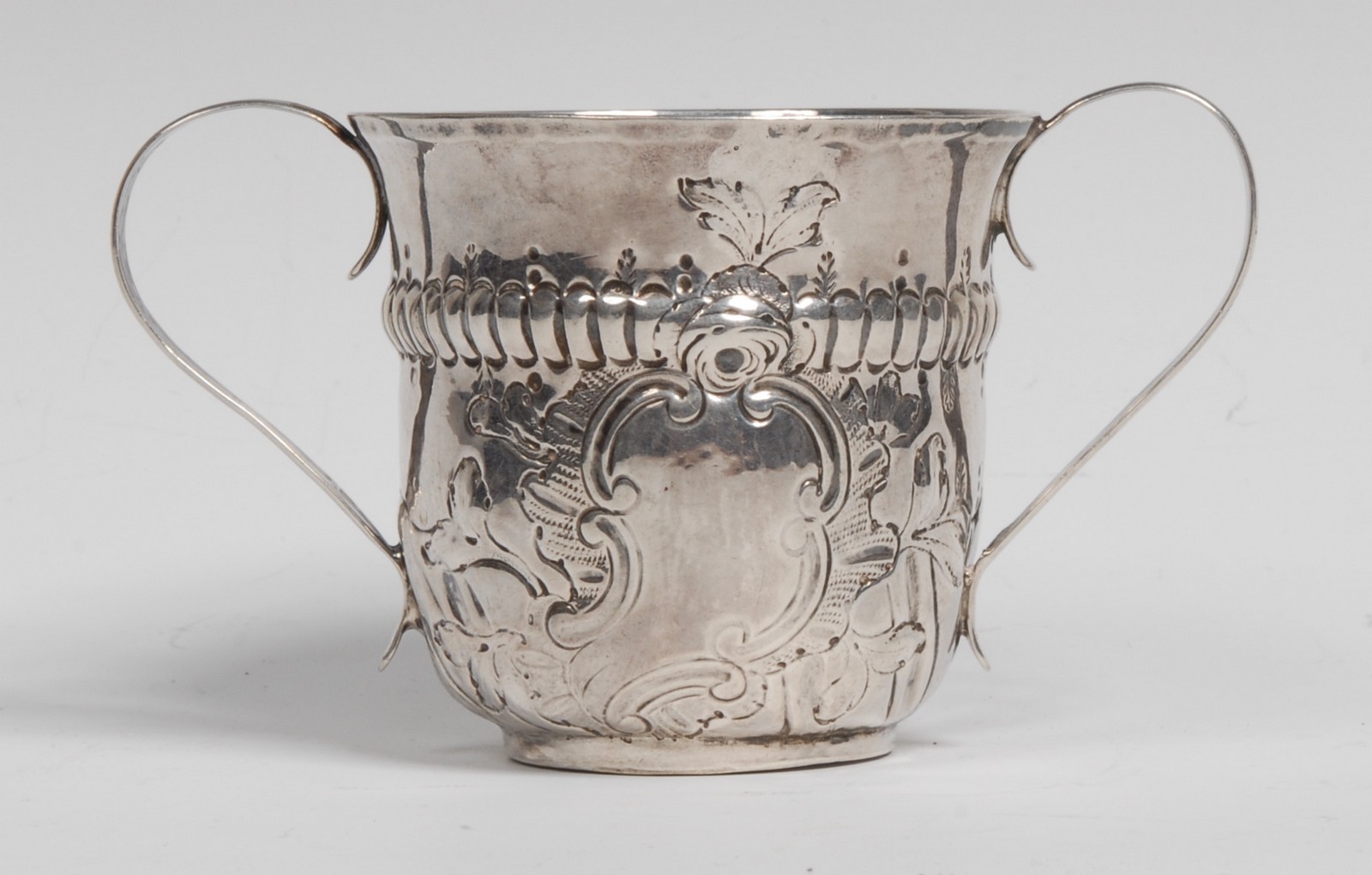 A George III silver porringer,