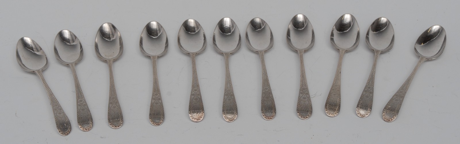 A set of eleven George III Bright-cut Old English pattern teaspoons, George Gray,