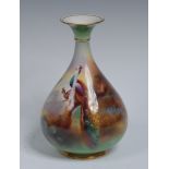 A James Hadley Royal Worcester ovoid bottle vase, painted by C White, signed,