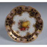 A Royal Worcester shaped circular plate, painted by Richard Seabright, signed,