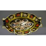 A Royal Crown Derby 1128 pattern shaped oval trinket tray, solid band, printed mark,