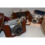 Cameras -  a Voigtlandor Vito B camera; a Zeiss Ikon Contina camera;