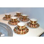 A set of six Royal Crown Derby 1128 coffee cups and saucers,