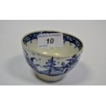 An 18th century Pearlware tea bowl, decorated in underglaze blue with pagodas, c.