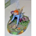 A Crown Staffordshire model of a Pixie,