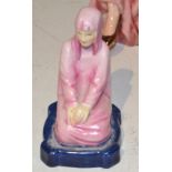 A Royal Worcester figure, of a kneeling girl, modelled by Phoebe Slabler,