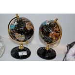 A pair of desk globes set with abalone,