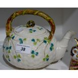 A Belleek Shamrock pattern globular tea kettle,