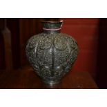 A 19th century Indian dark patinated lobed ovoid vase,