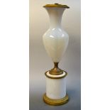 An early 20th century ormolu mounted opalescent glass ovoid pedestal table lamp,