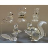 A Swarovski Crystal model of a squirrel, another, fox,