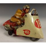 A Huki Toys (Germany) tinplate Touring Motorbike - red, yellow rider, friction drive,