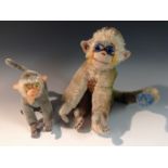 A Steiff (Germany) mohair Mungo the monkey, straw filled body, blue glass eyes, 22cm high,