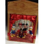 Walt Disney - a Theatre type animated display unit with five Pelham puppets,