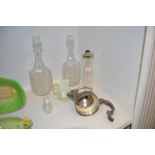 A pair of glass decanters;  another,