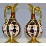 A pair of Royal Crown Derby 1128 pattern Kedleston ewers,