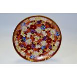 A Japanese One Hundred Flowers pattern circular plate, 24.