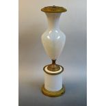 An early 20th century ormolu mounted opalescent glass ovoid pedestal table lamp,