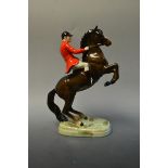 Beswick hunstman on rearing horse,