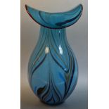 A large Italian style studio glass vase, in swirling shades of blue, out swept arched lip,