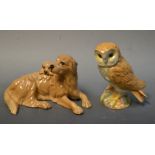 A Royal Doulton model Golden Retriever and Pup Da142, Boxed;  a John Beswick model Barn Owl,